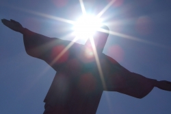 Sun Flashing in the Back of Christ