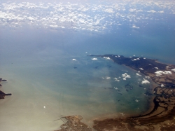 View of Great Barrier Reef Water from Boeing 737 on the Way to Cairns